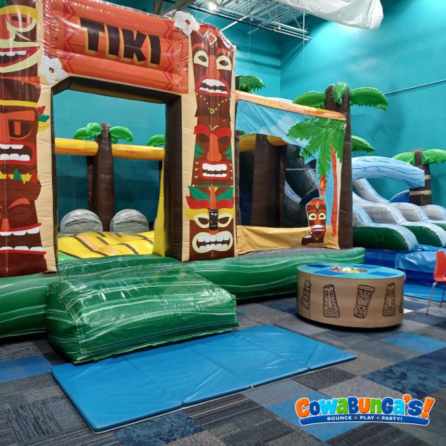 Tiki-themed inflatable play space at Cowabunga’s Manchester, NH