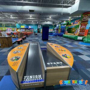 Game lanes and inflatable play attractions at Cowabunga’s North Reading, MA
