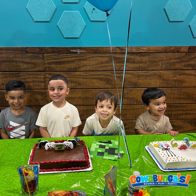 Children gathered at a birthday table at Cowabunga’s North Reading, MA